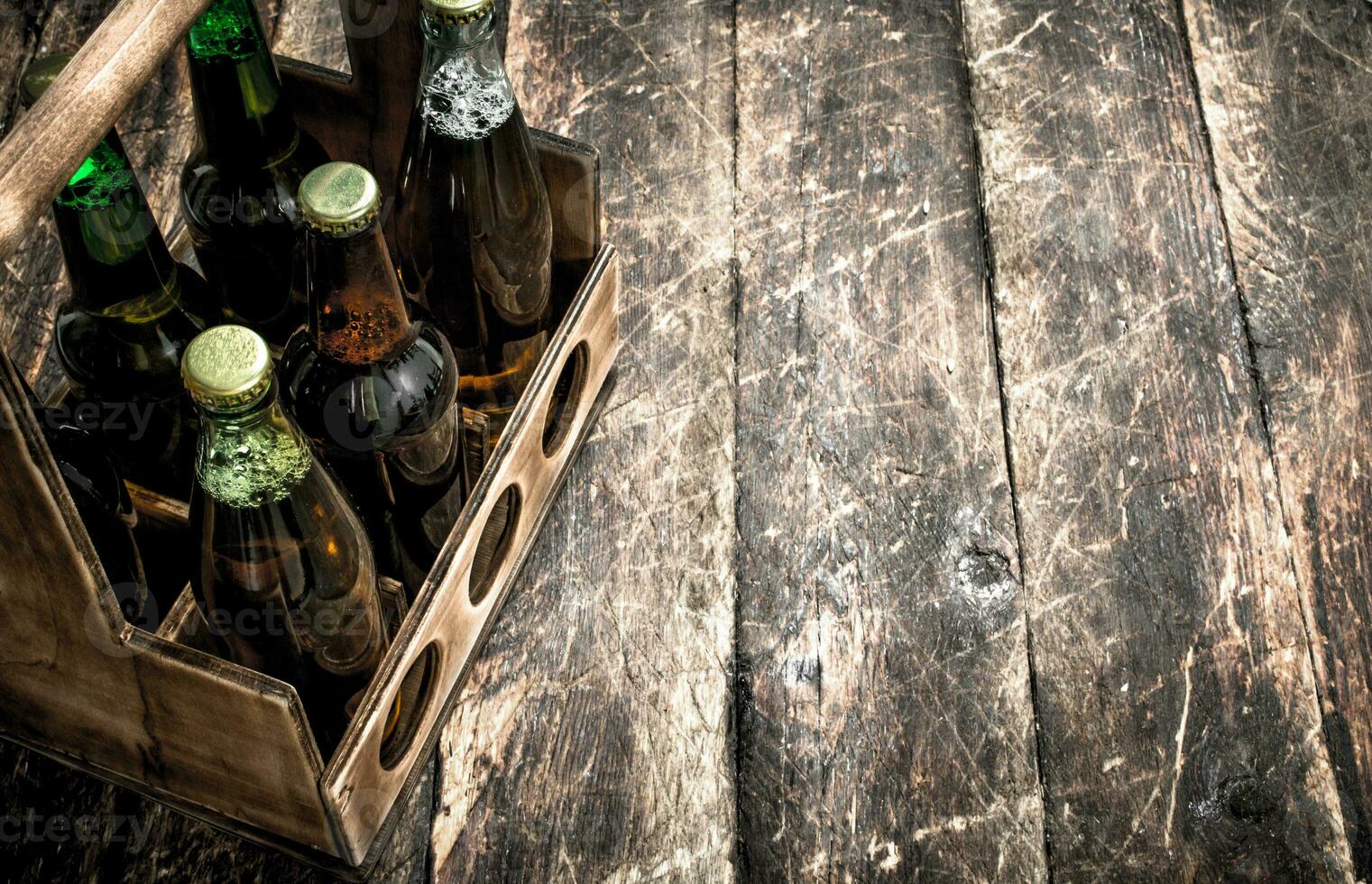 box with bottles of fresh beer. photo