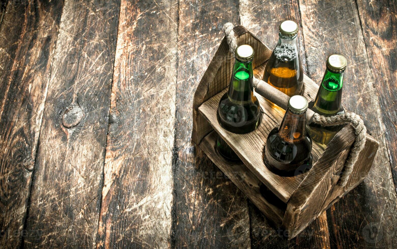 box with bottles of fresh beer. photo