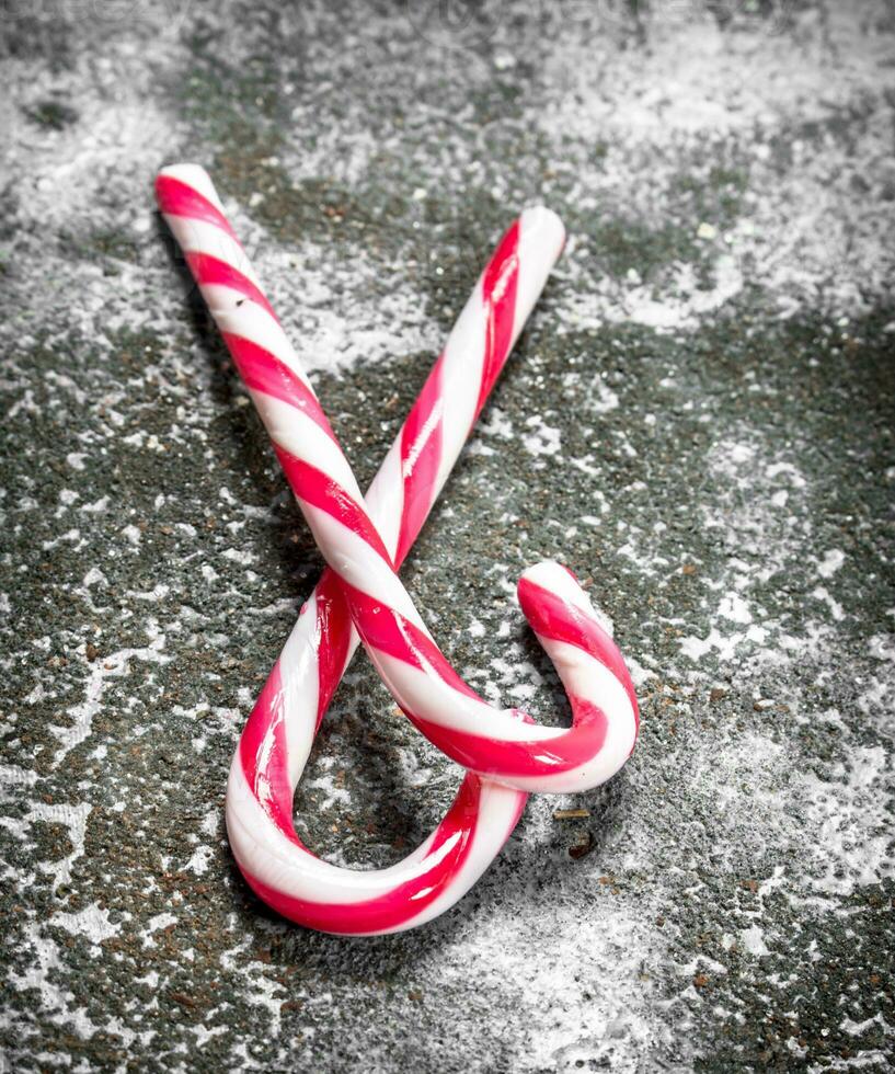 two New Year's sweets. On rustic background. photo