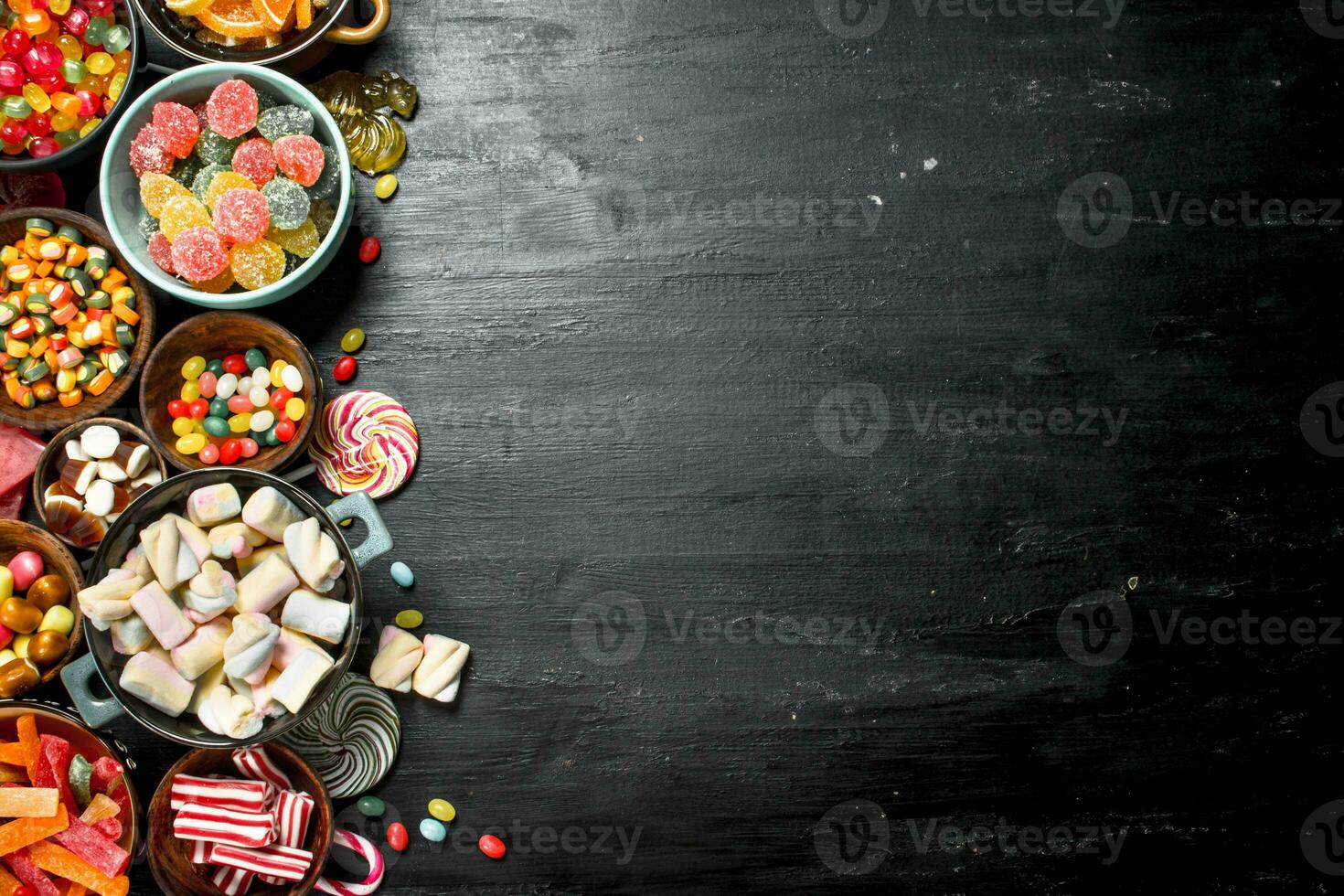Different sweet candy, jelly and candied in a bowl. photo