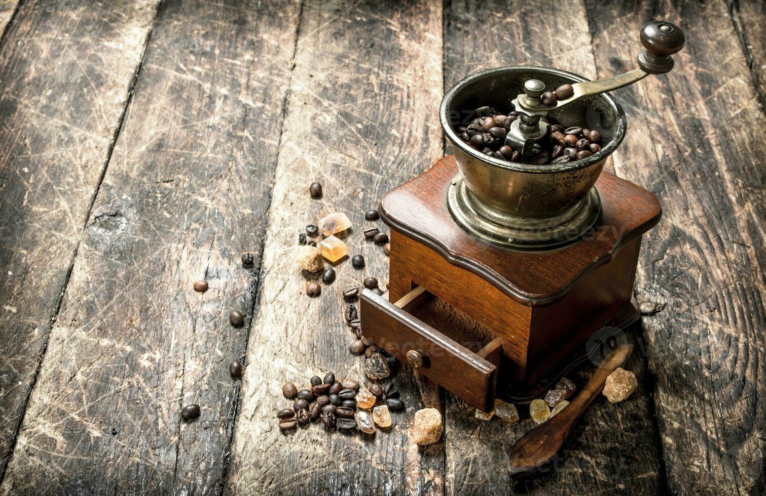 Coffee grinder with coffee beans. photo