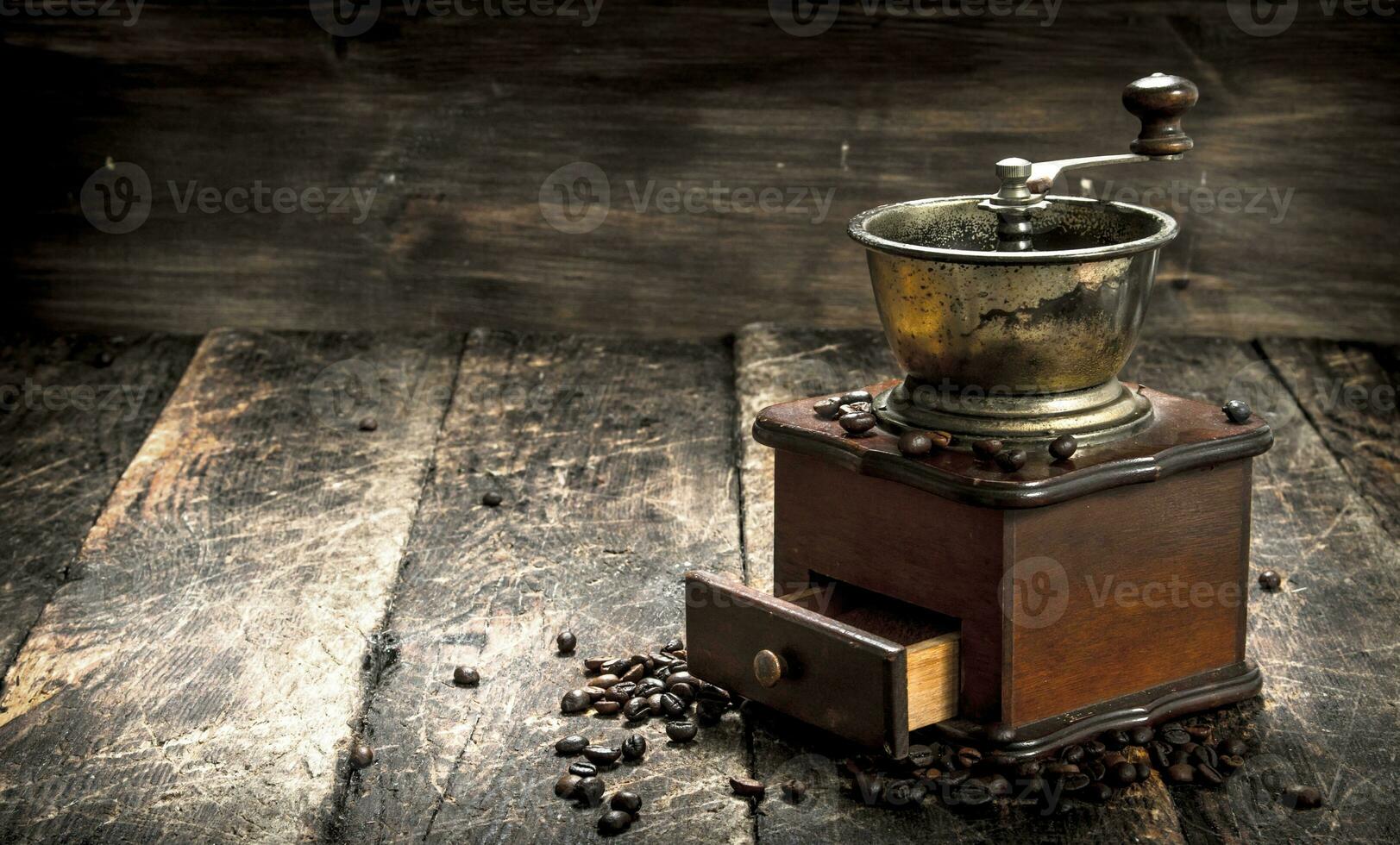 Coffee grinder with coffee beans. photo
