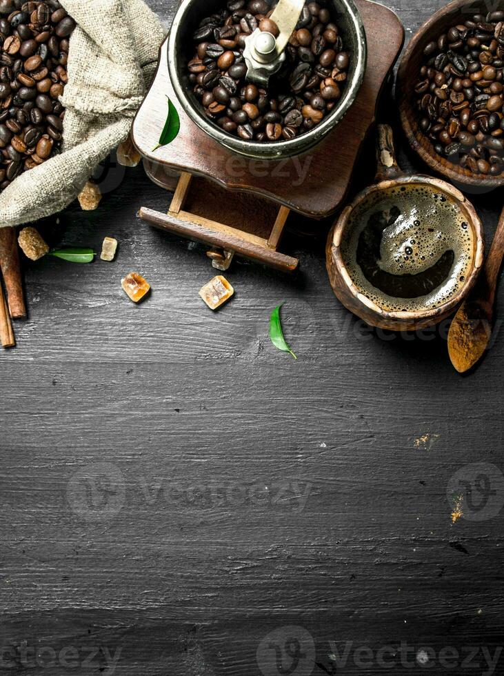 Coffee background. Fresh coffee with sugar crystals and coffee beans. photo