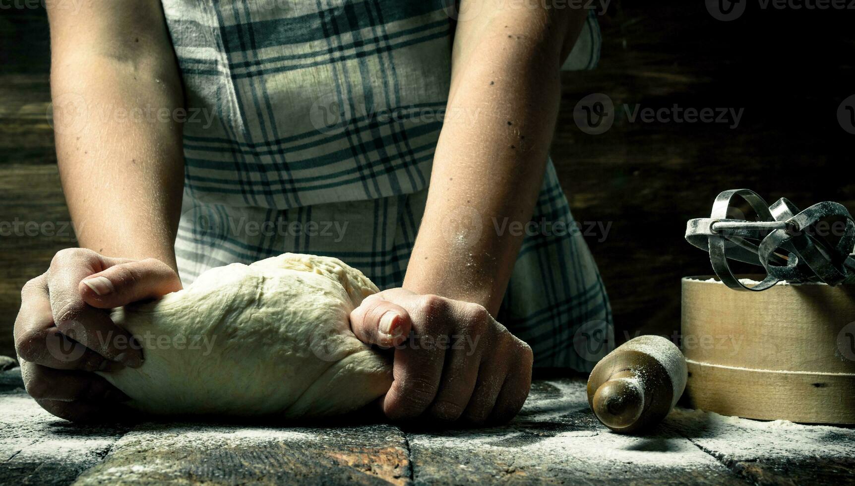 Dough background. Preparation of dough with tools. photo