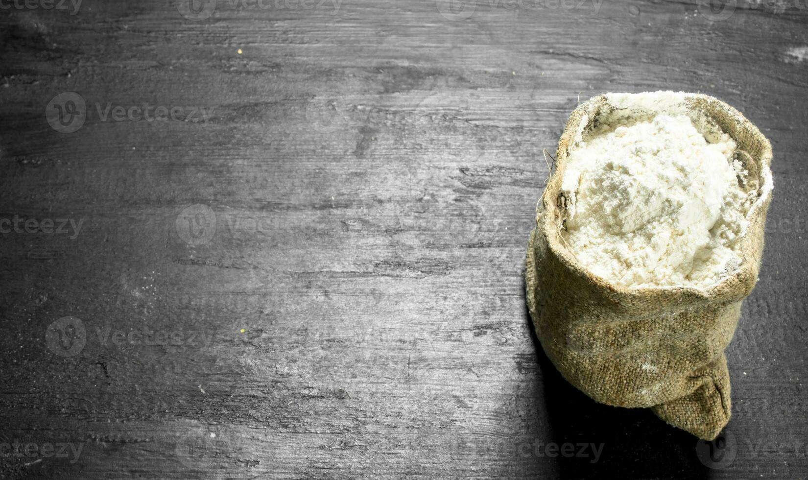 Flour in an old sack. photo