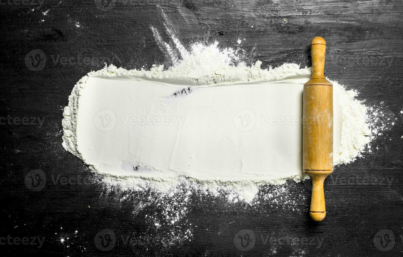 Flour with rolling pin. photo