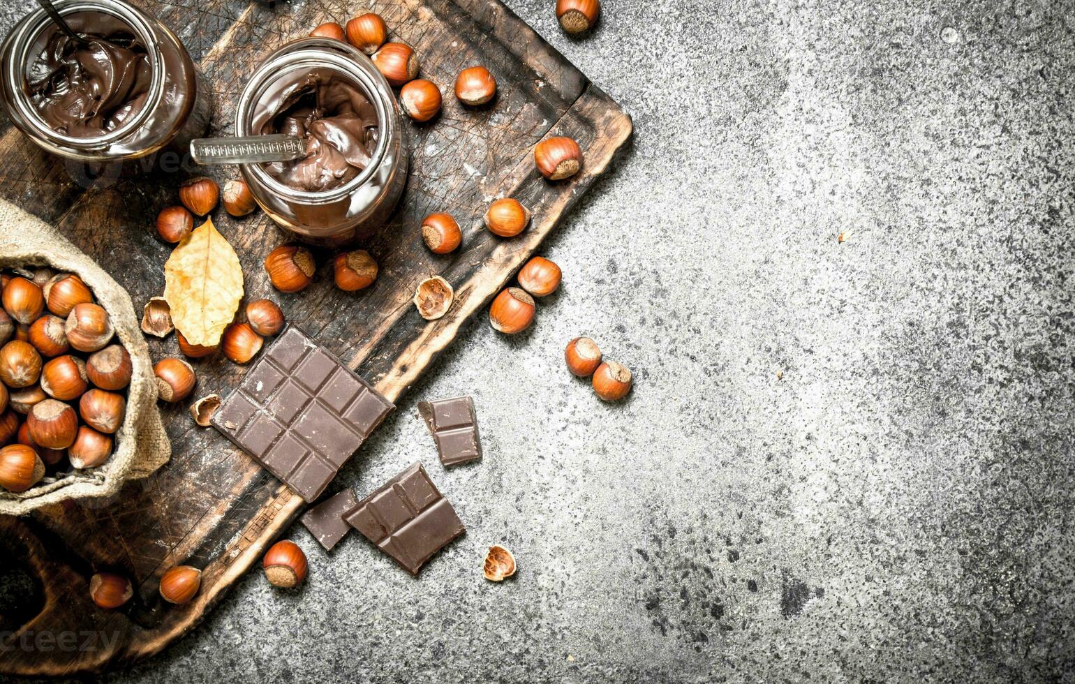 Chocolate butter with hazelnuts. photo