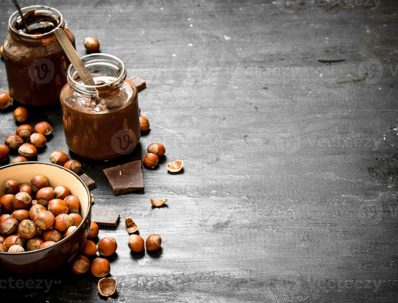 Chocolate butter with hazelnuts. photo