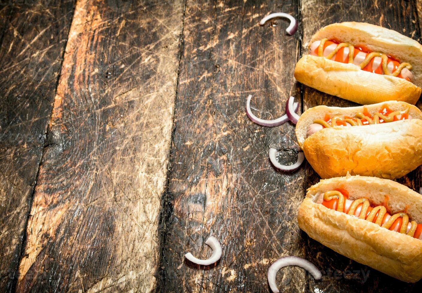Street Food. Hot dogs with mustard and tomato sauce. photo