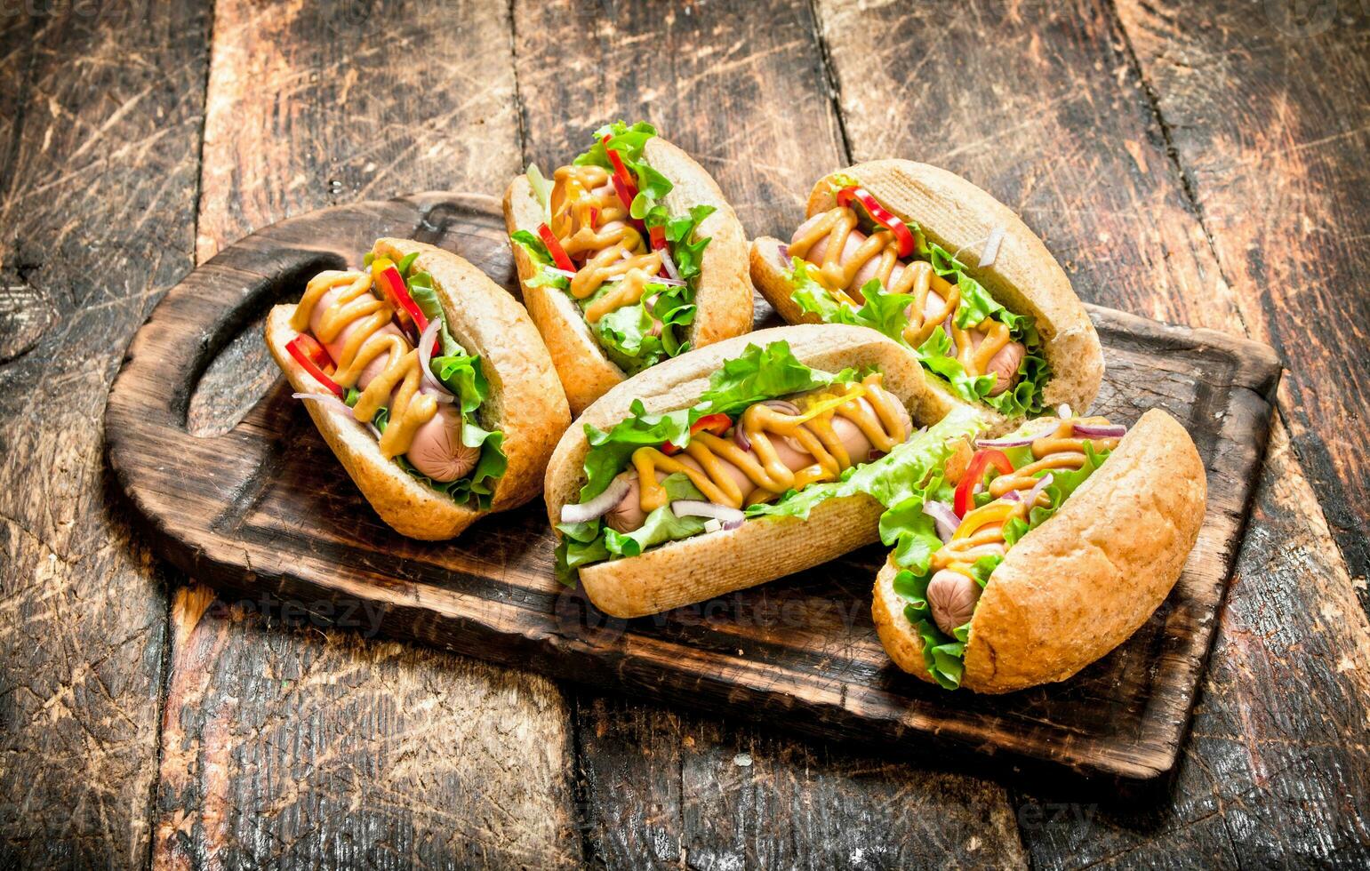 Street food. hot Dogs with herbs, vegetables and hot mustard. photo