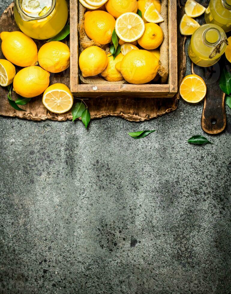 Fresh lemonade from ripe lemons in the box. photo