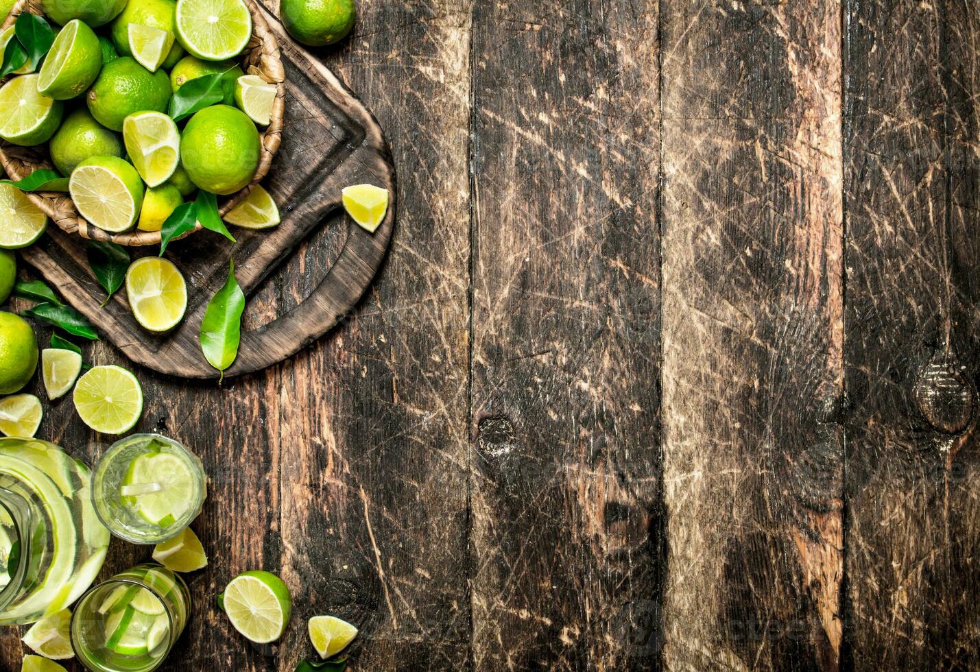 Fresh drink with lime slices. photo
