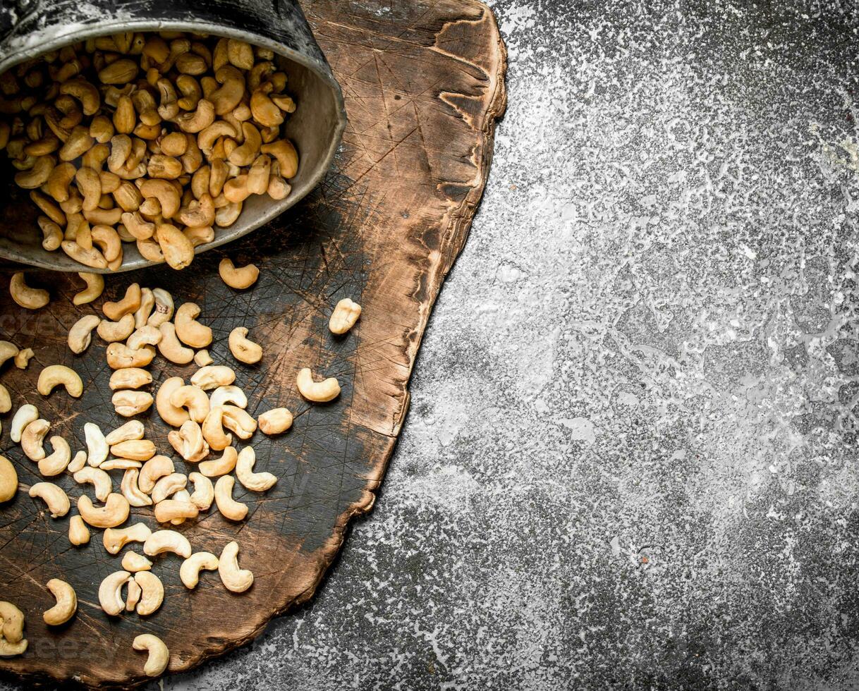 Cashews in the old bucket. photo