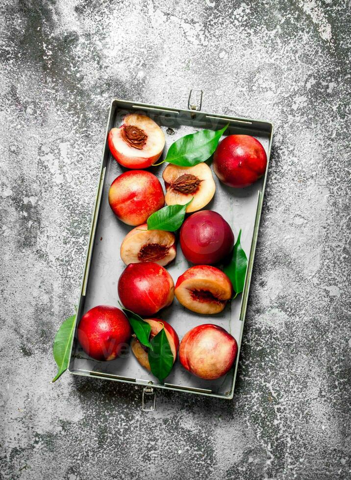 Peaches in the box. photo