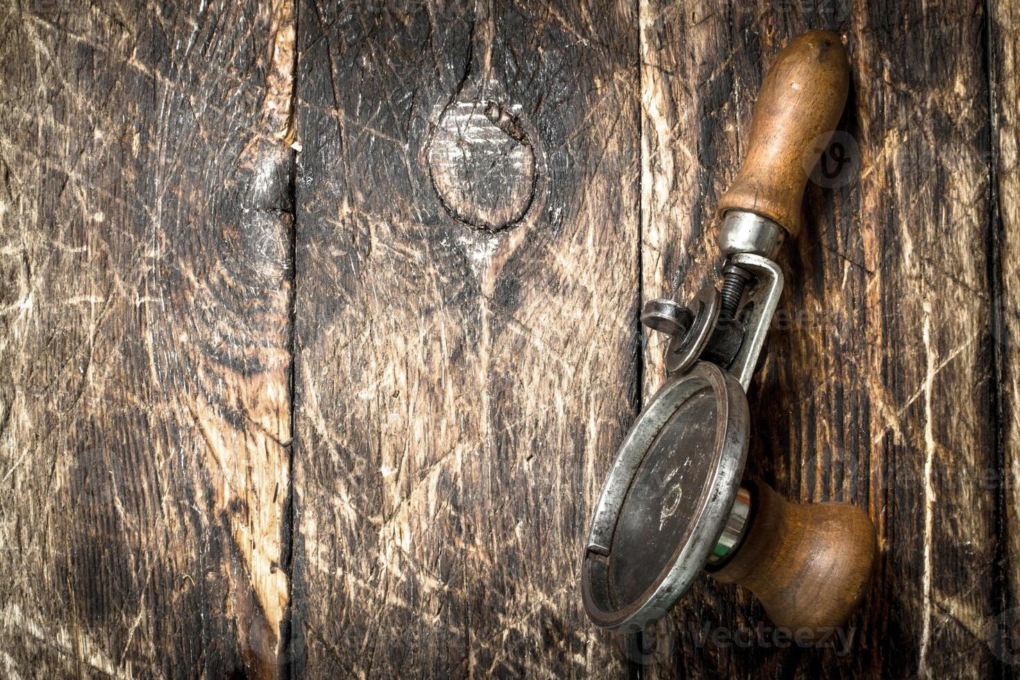Old seamer. On wooden background. photo