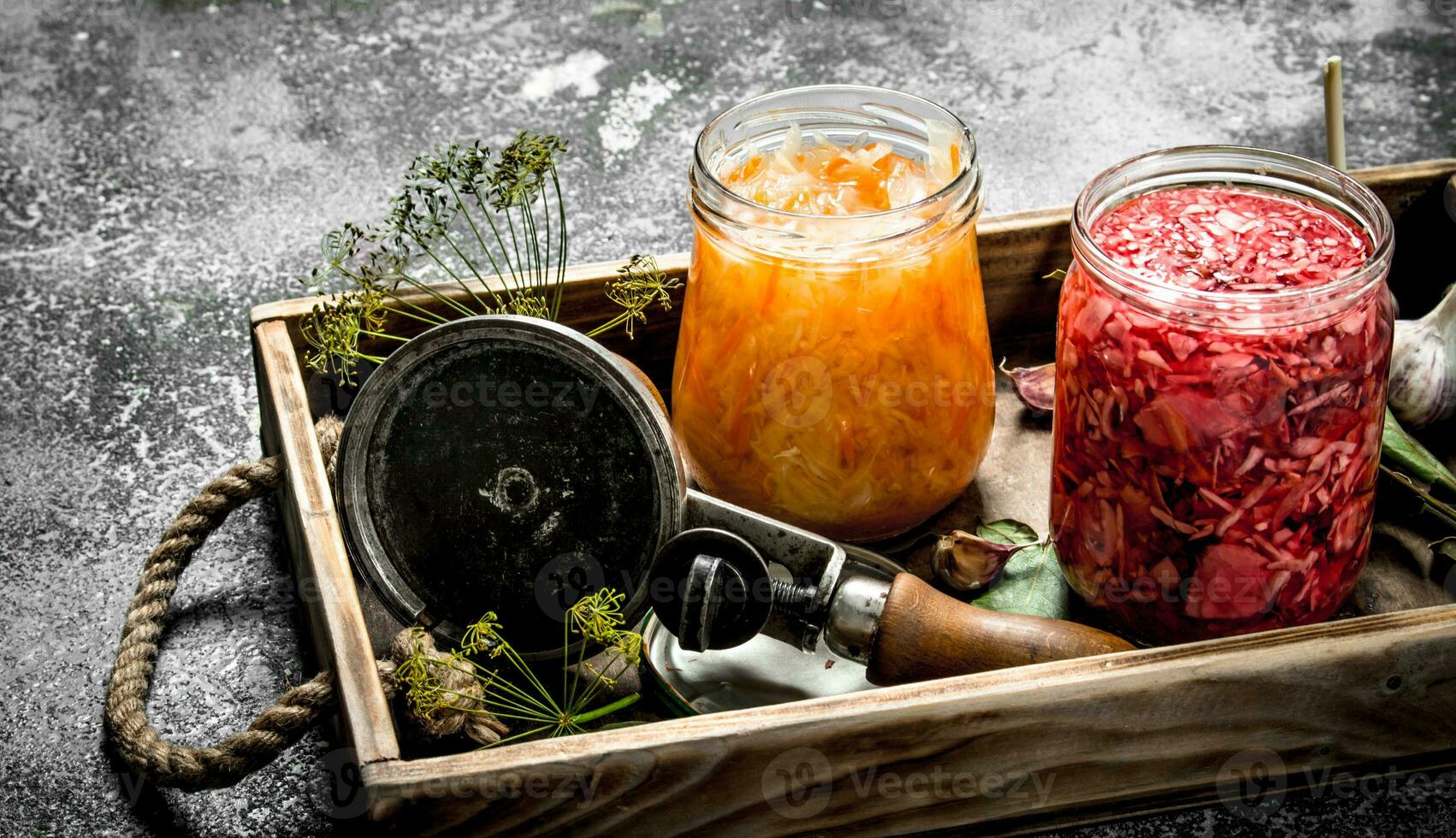 Marinated cabbage with herbs and seamer on a tray. photo