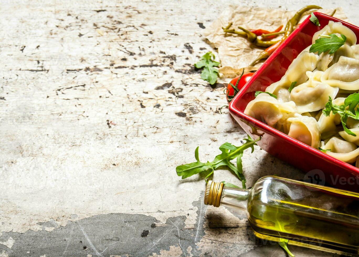 Homemade ravioli stuffed with greens in a Cup. photo