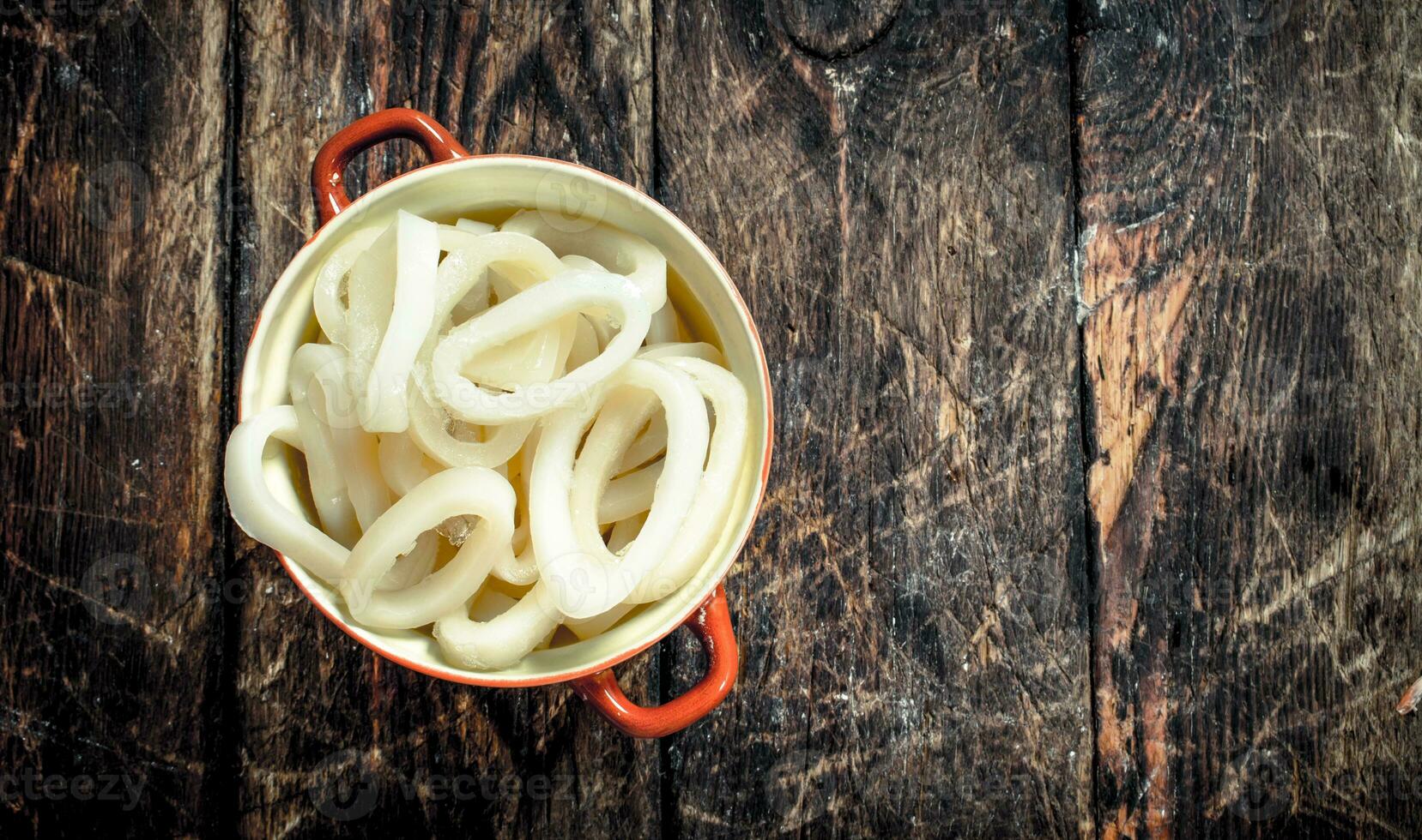 Rings of sea squid in a bowl. photo