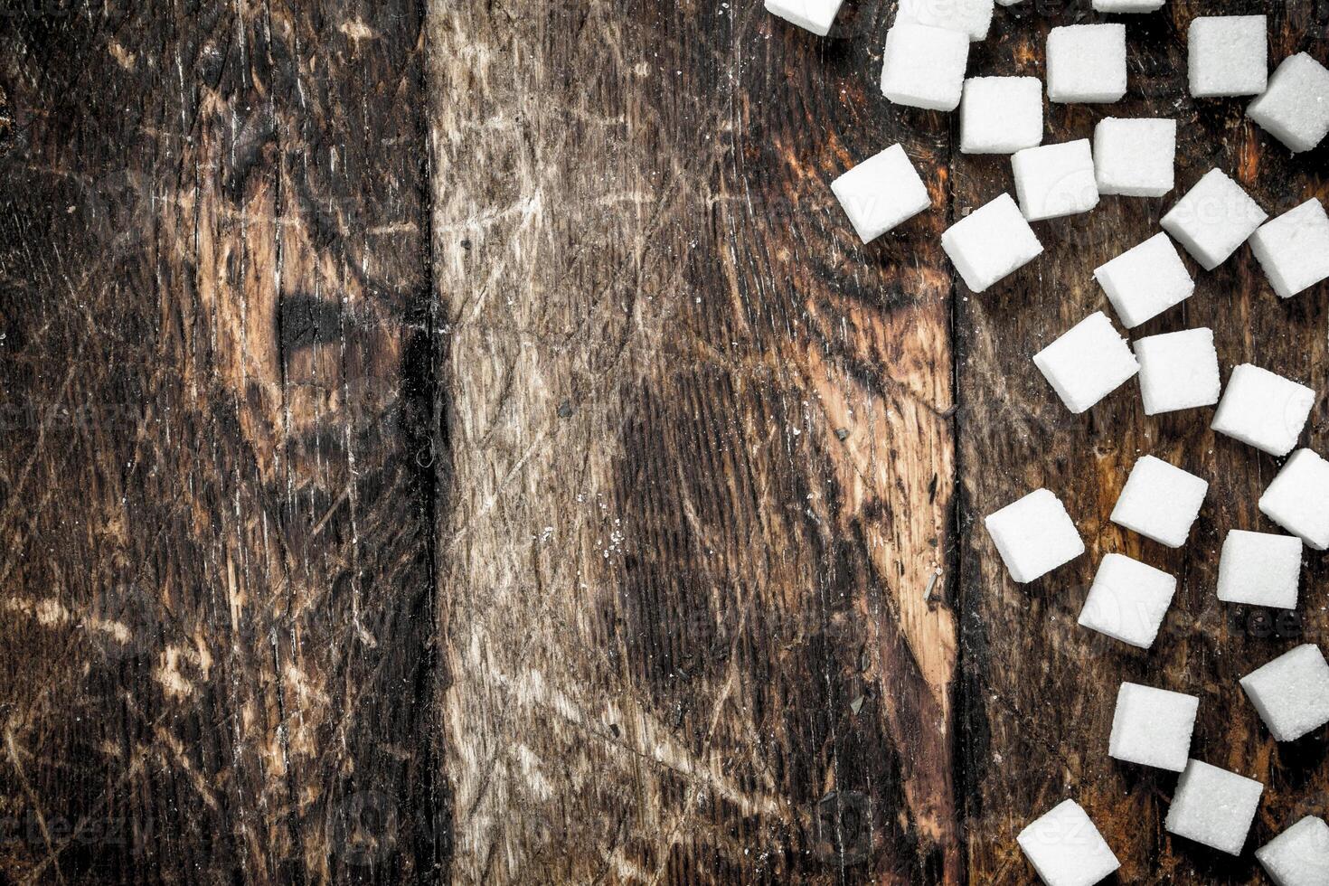 Refined cubes sugar. photo