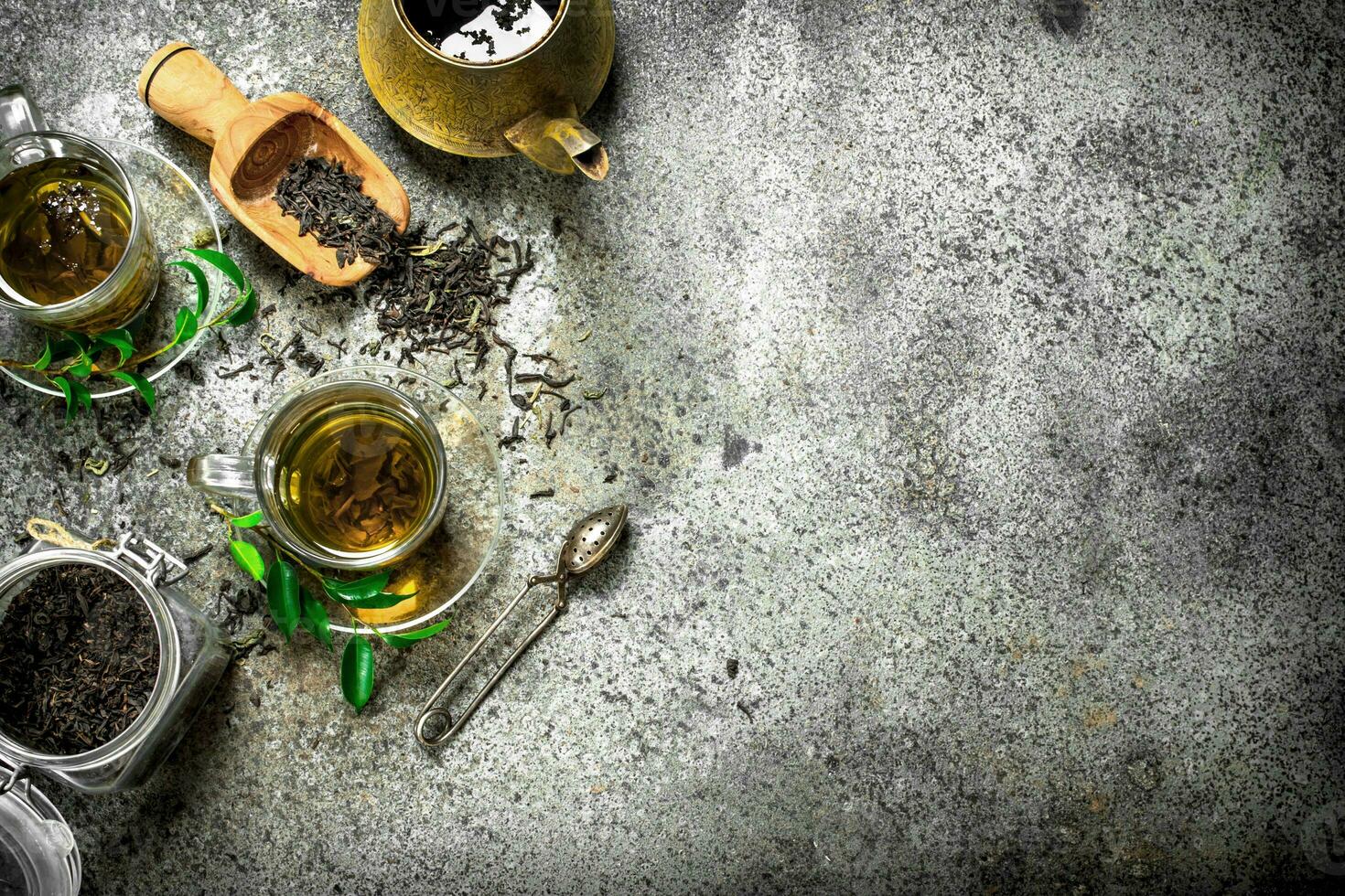 Fresh Indian tea with a brewer. photo