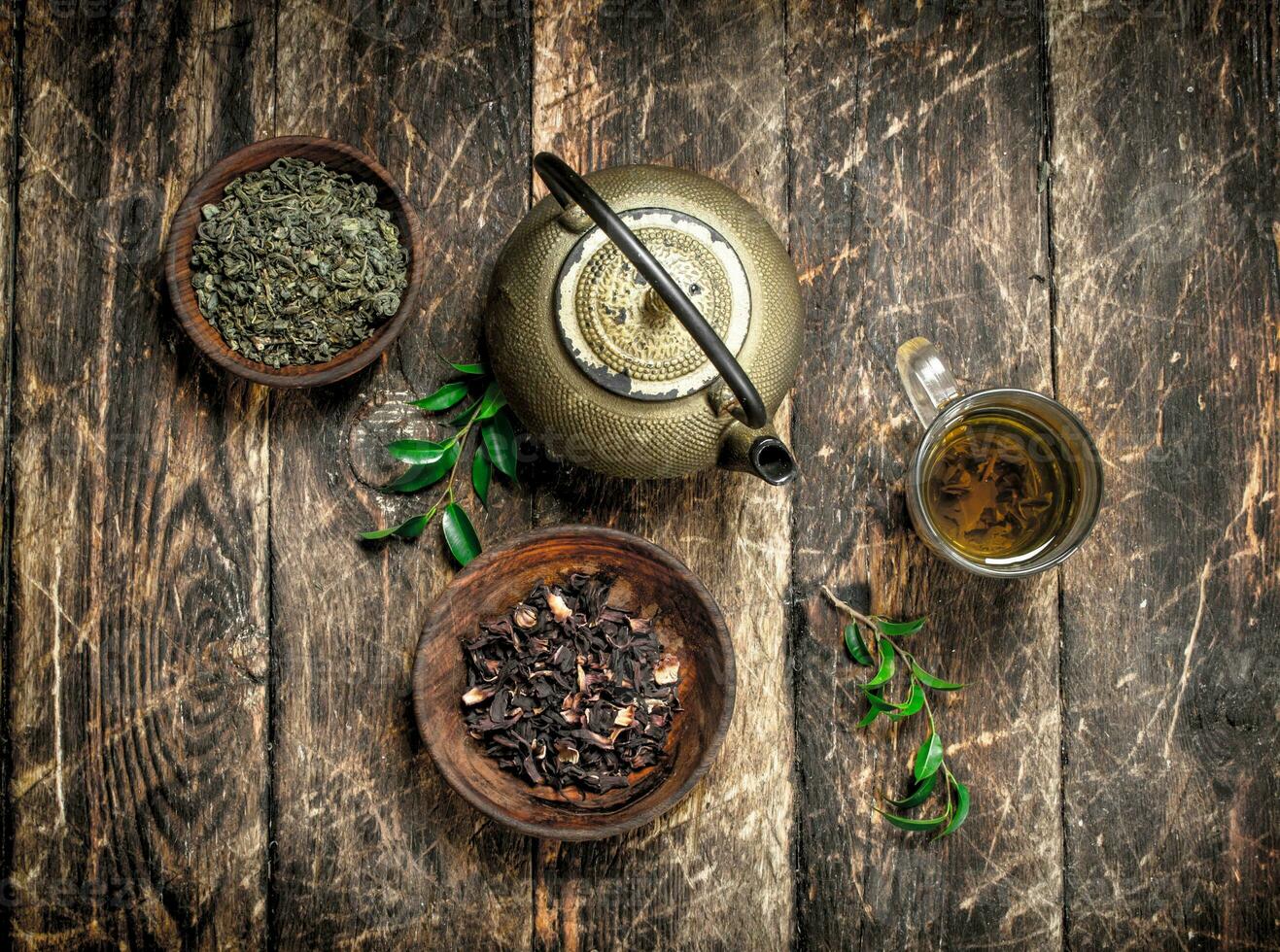 Teapot with green Indian tea. photo