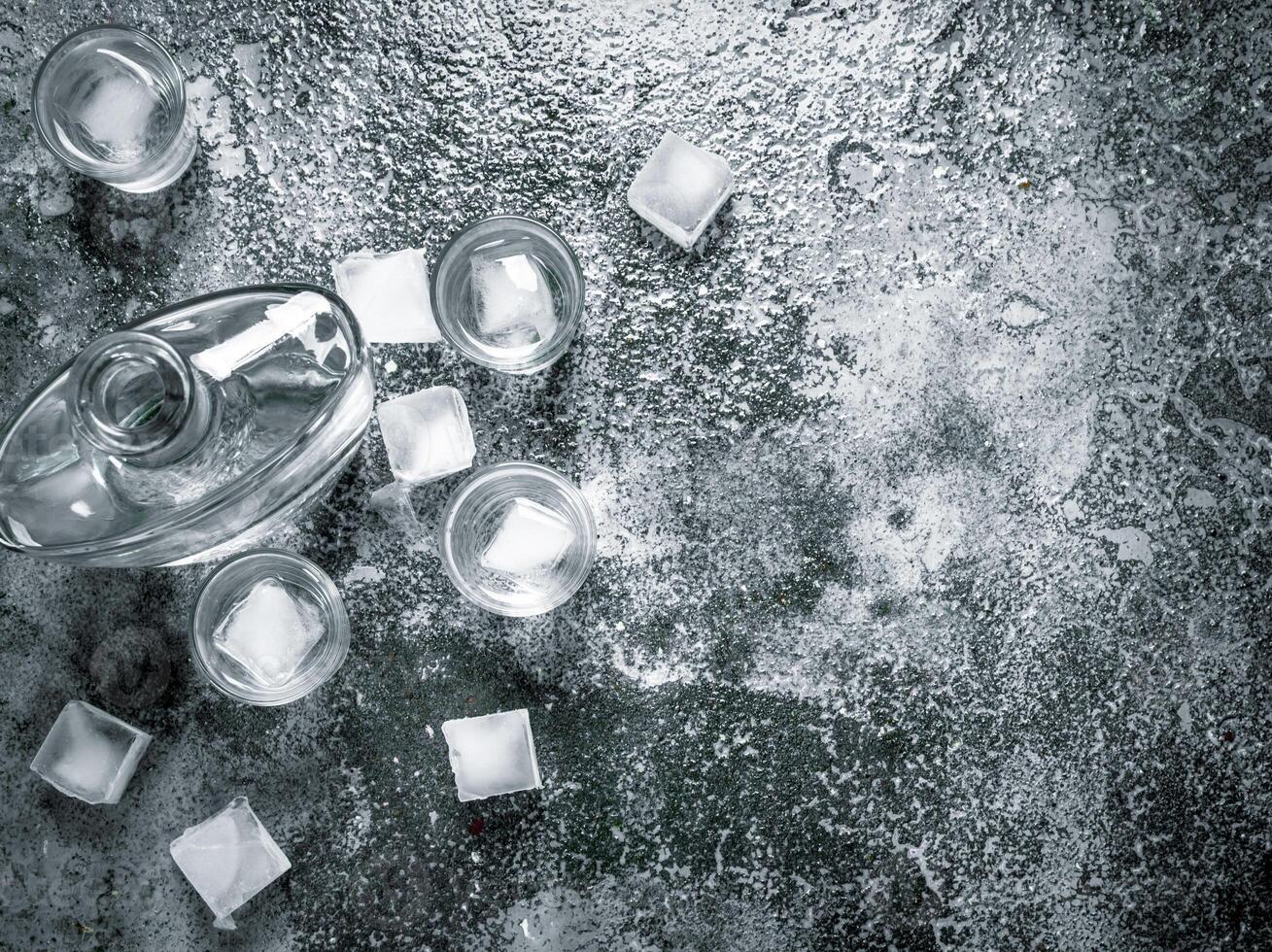 Vodka with ice in glasses. photo