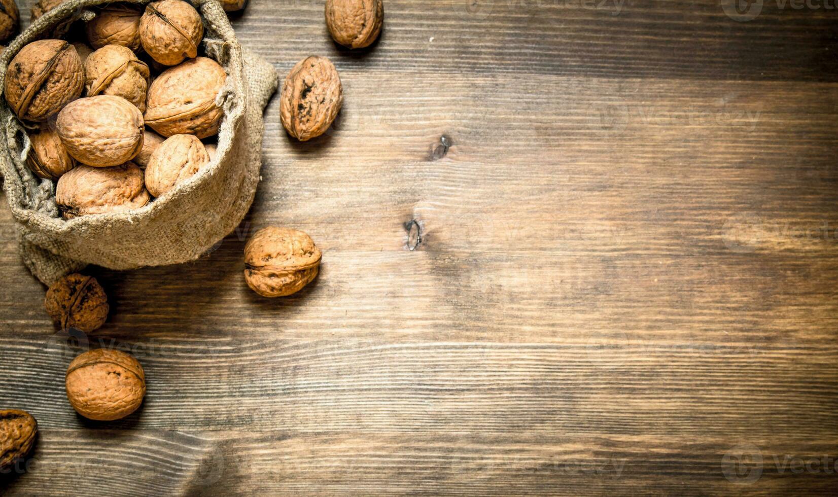 Walnuts in the old sack. photo