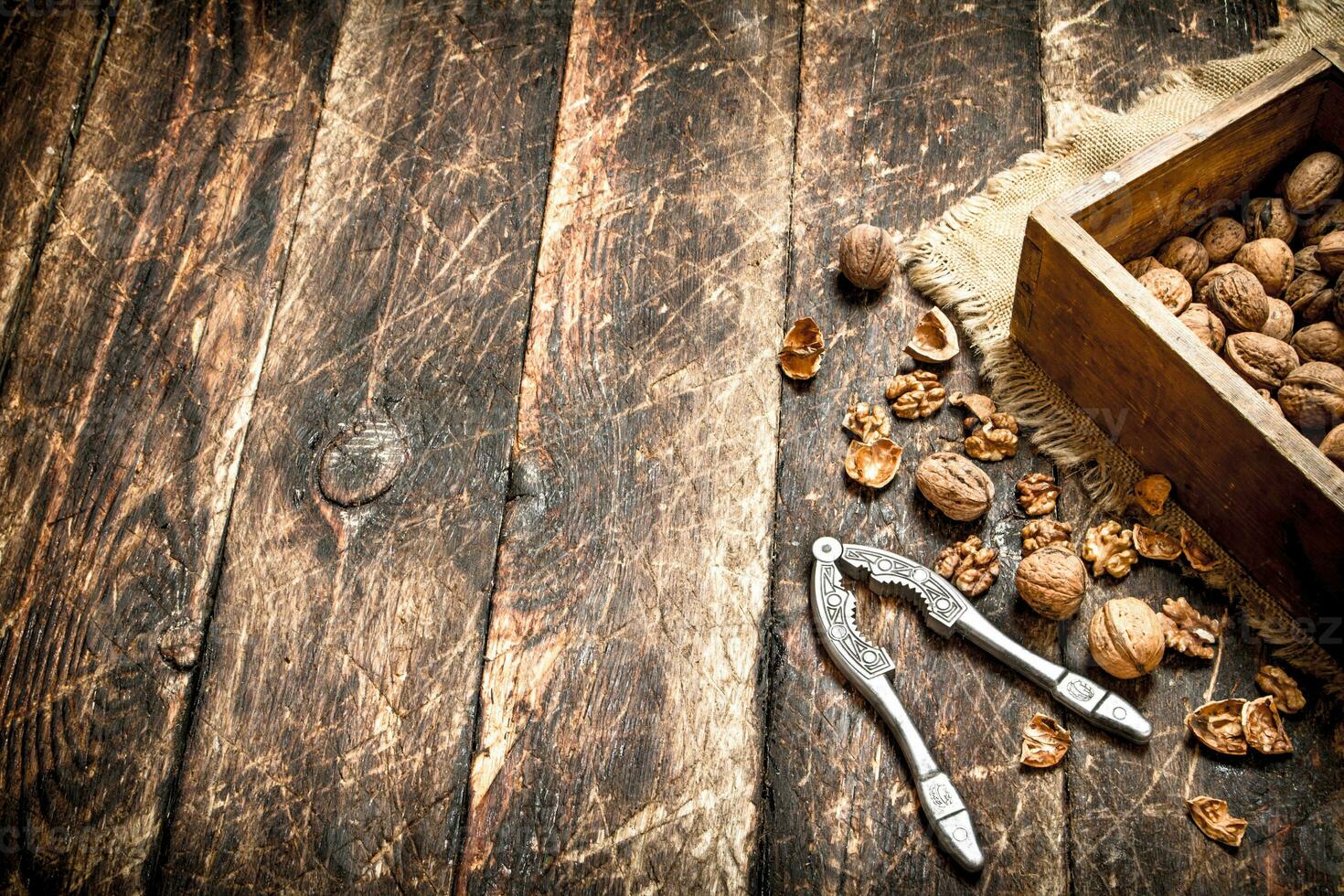 Walnuts in the box with the Nutcracker. photo