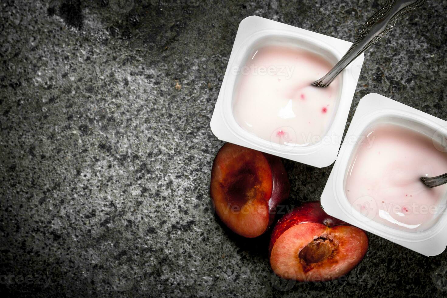 Natural yogurt in a bowl. photo