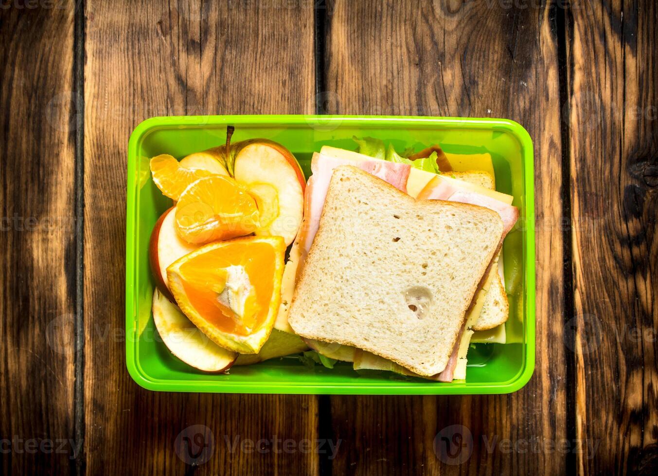 The picnic set. Sandwiches with fruit. photo