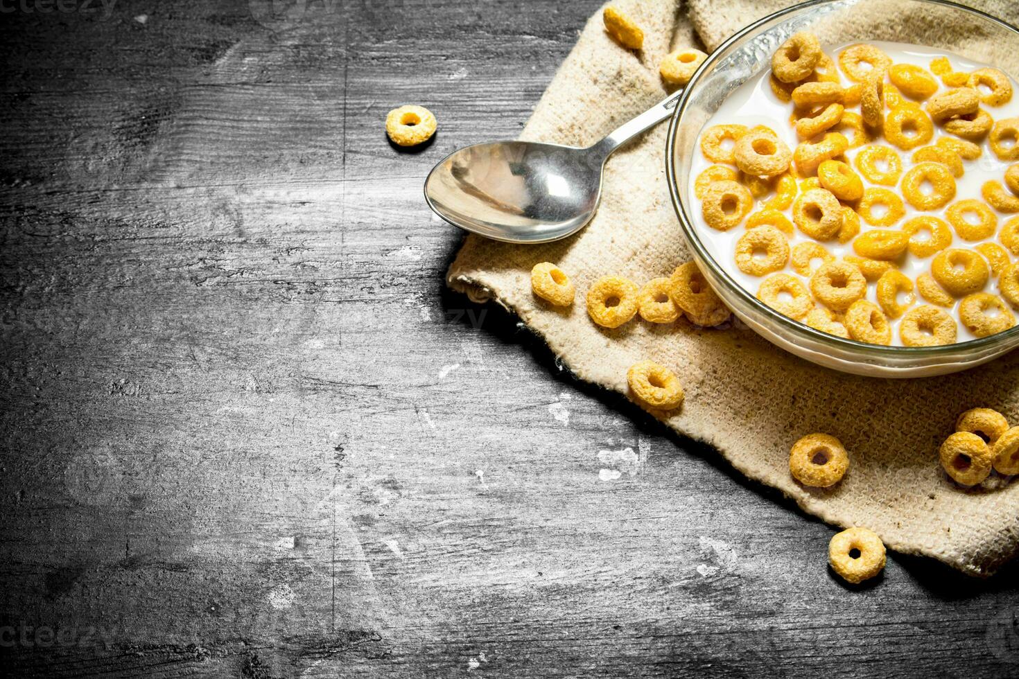 Cereal with milk in a glass dish. photo