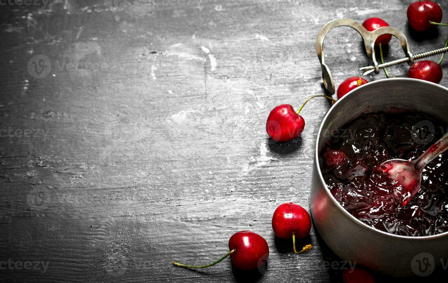 Cherry jam in a saucepan. photo