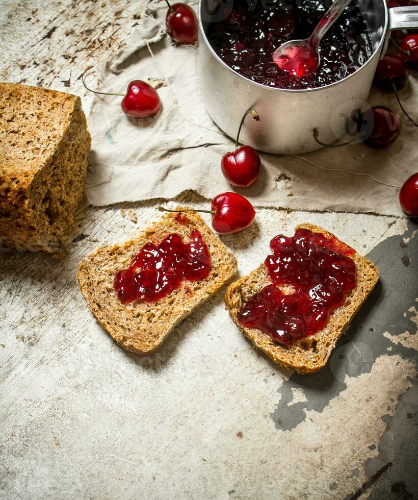 The sandwich with sour cherry jam. photo