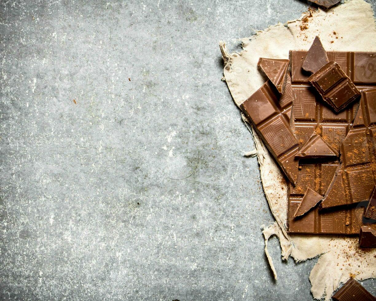 Chocolate on the old fabric. photo