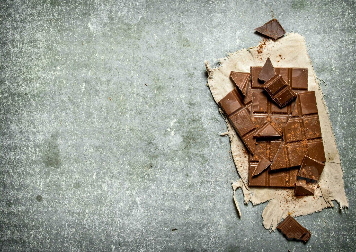 Chocolate on the old fabric. photo