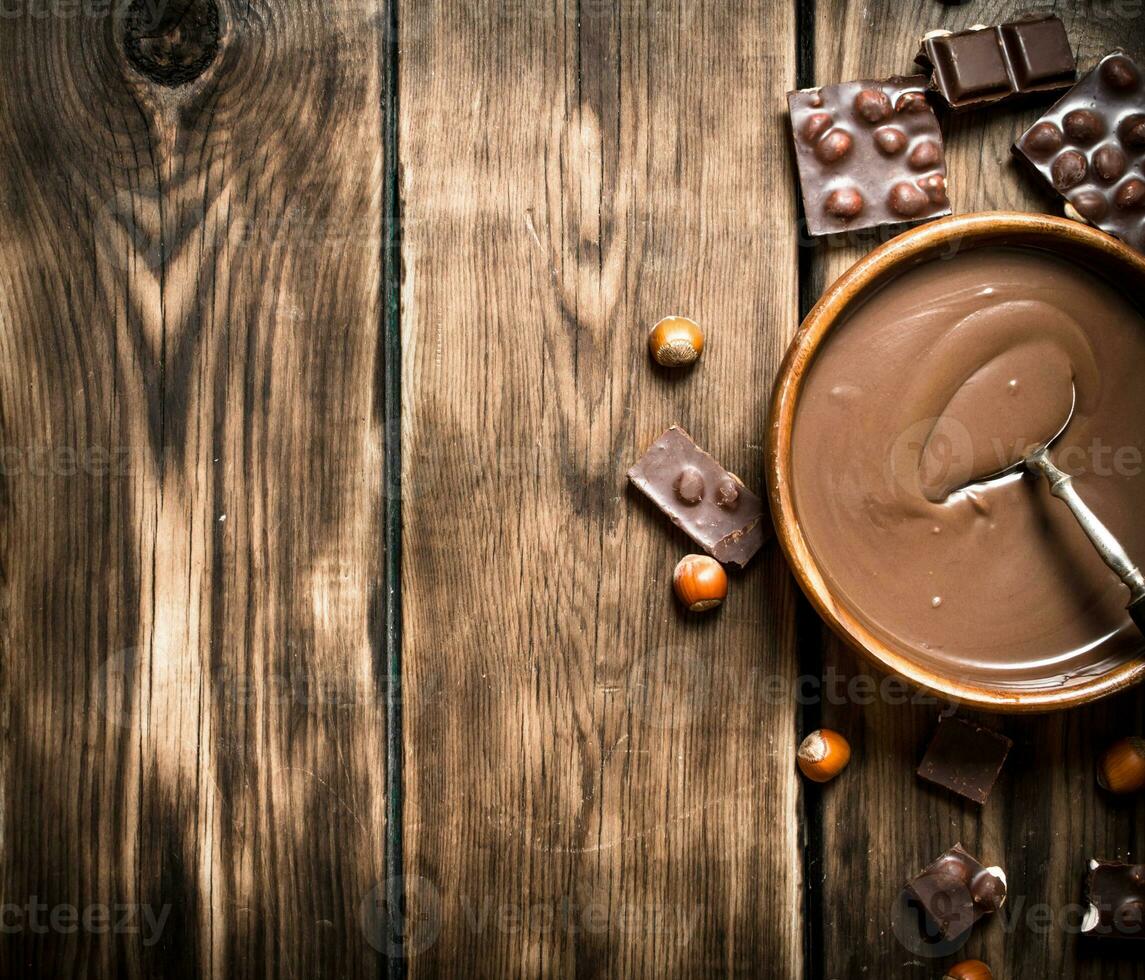 Chocolate cream with nuts. photo