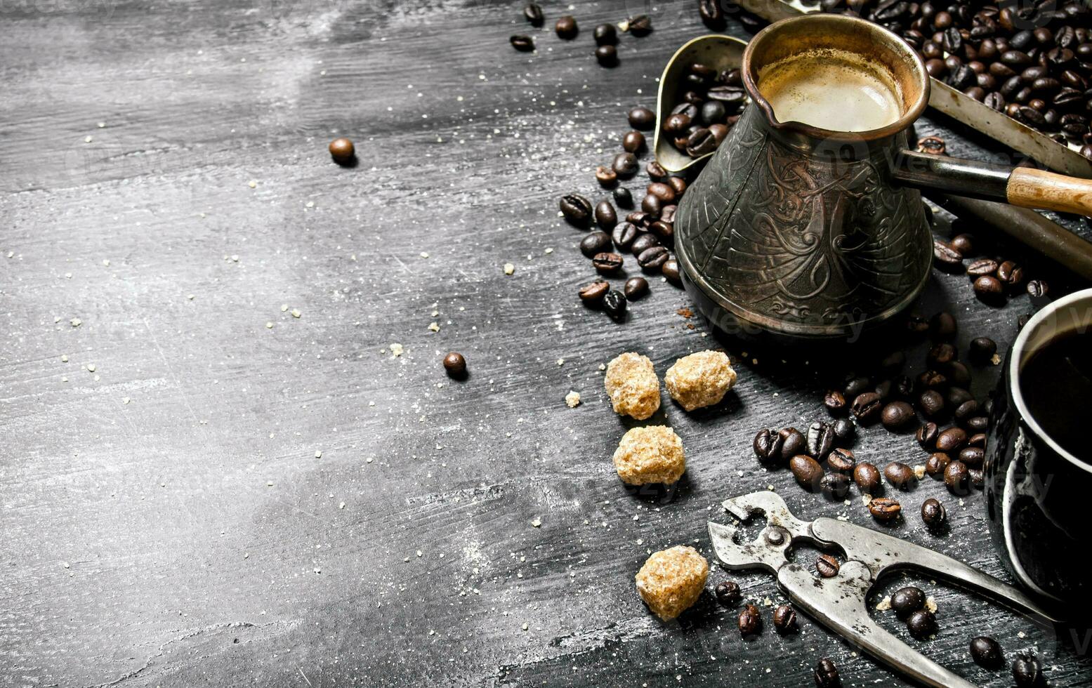 Brewed coffee pot with sugar photo