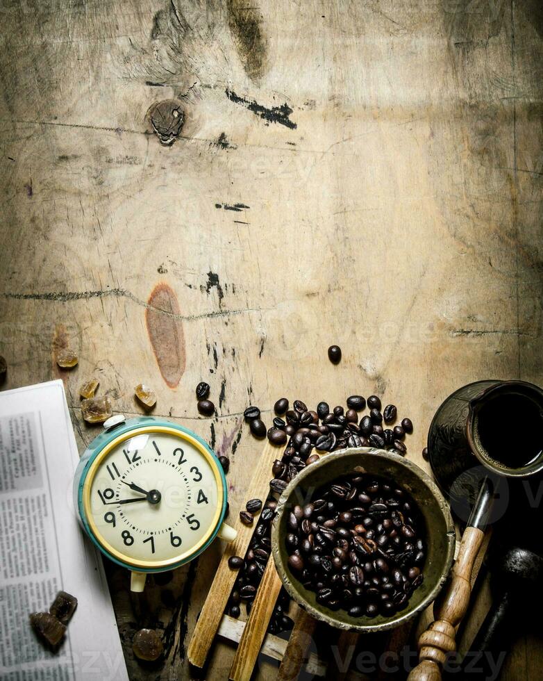 Coffee style. Morning coffee with fresh newspaper. photo
