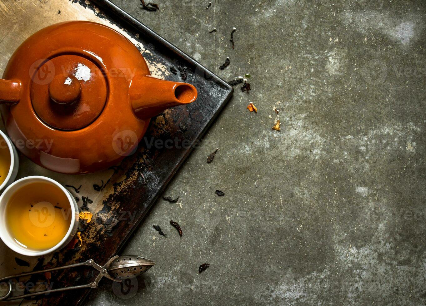 Fragrant tea brewed in a teapot. photo