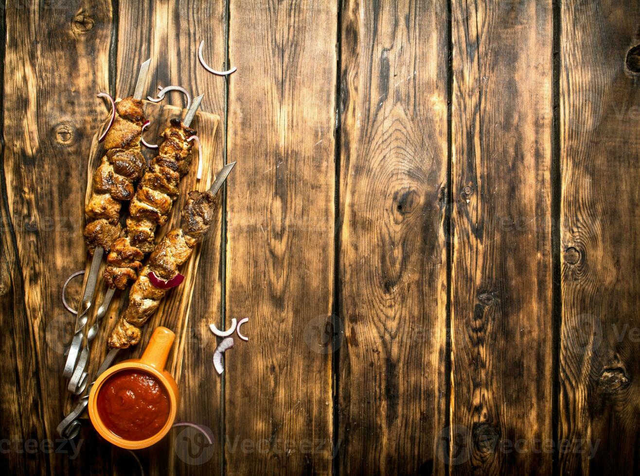 Kebab with tomato sauce. photo