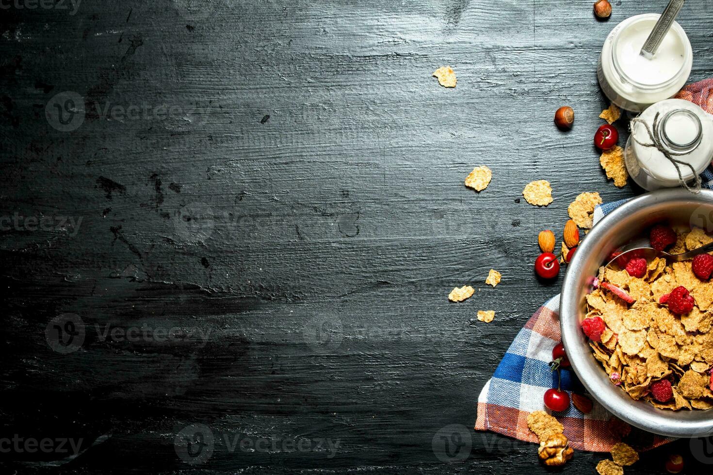 Fitness food. Muesli with ripe berries and milk. photo