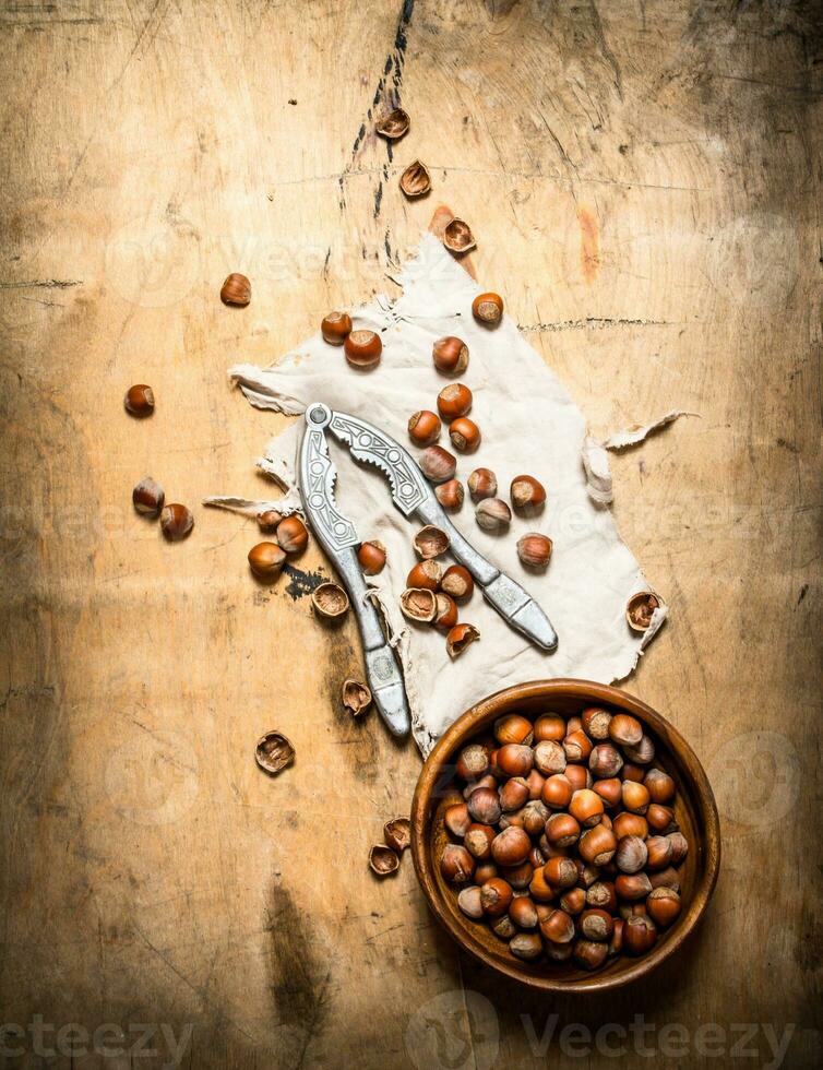 Nuts with Nutcracker and shell. photo
