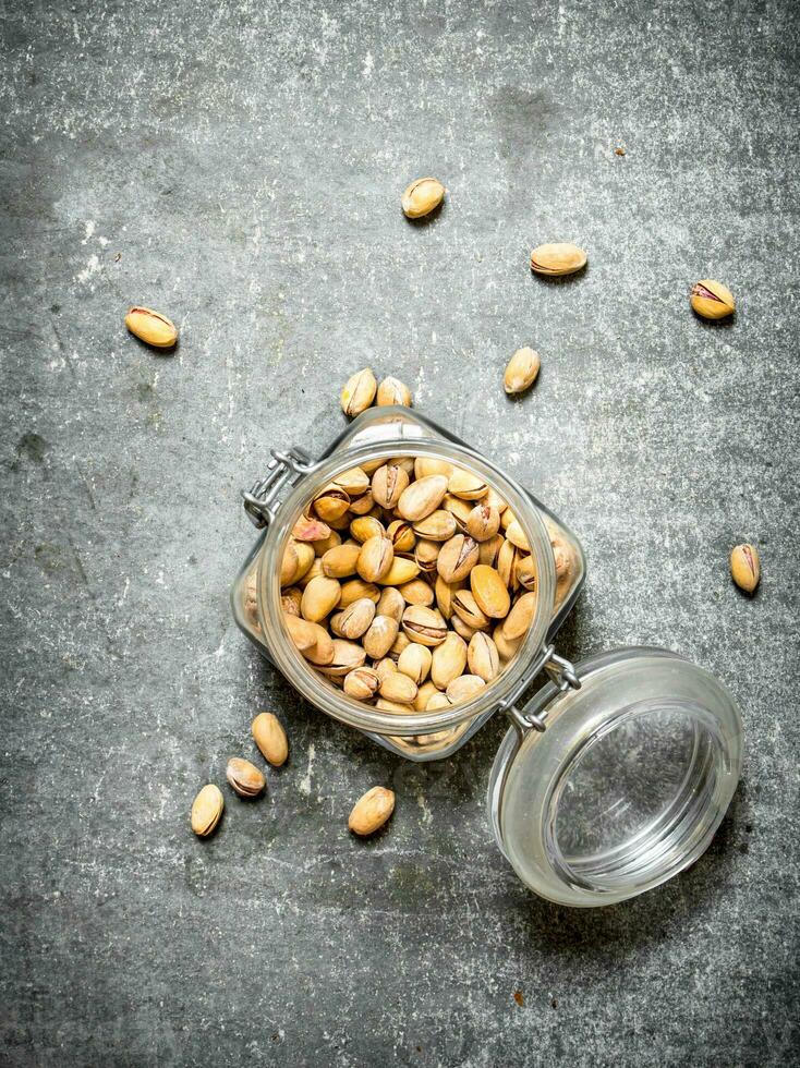 Pistachios in the jar. photo