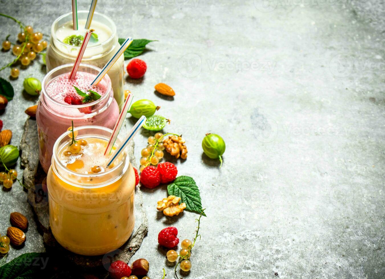 Berry smoothies with nuts. 32034105 Stock Photo at Vecteezy