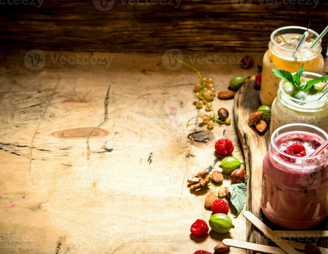 Berry smoothie with wild berries and nuts. photo