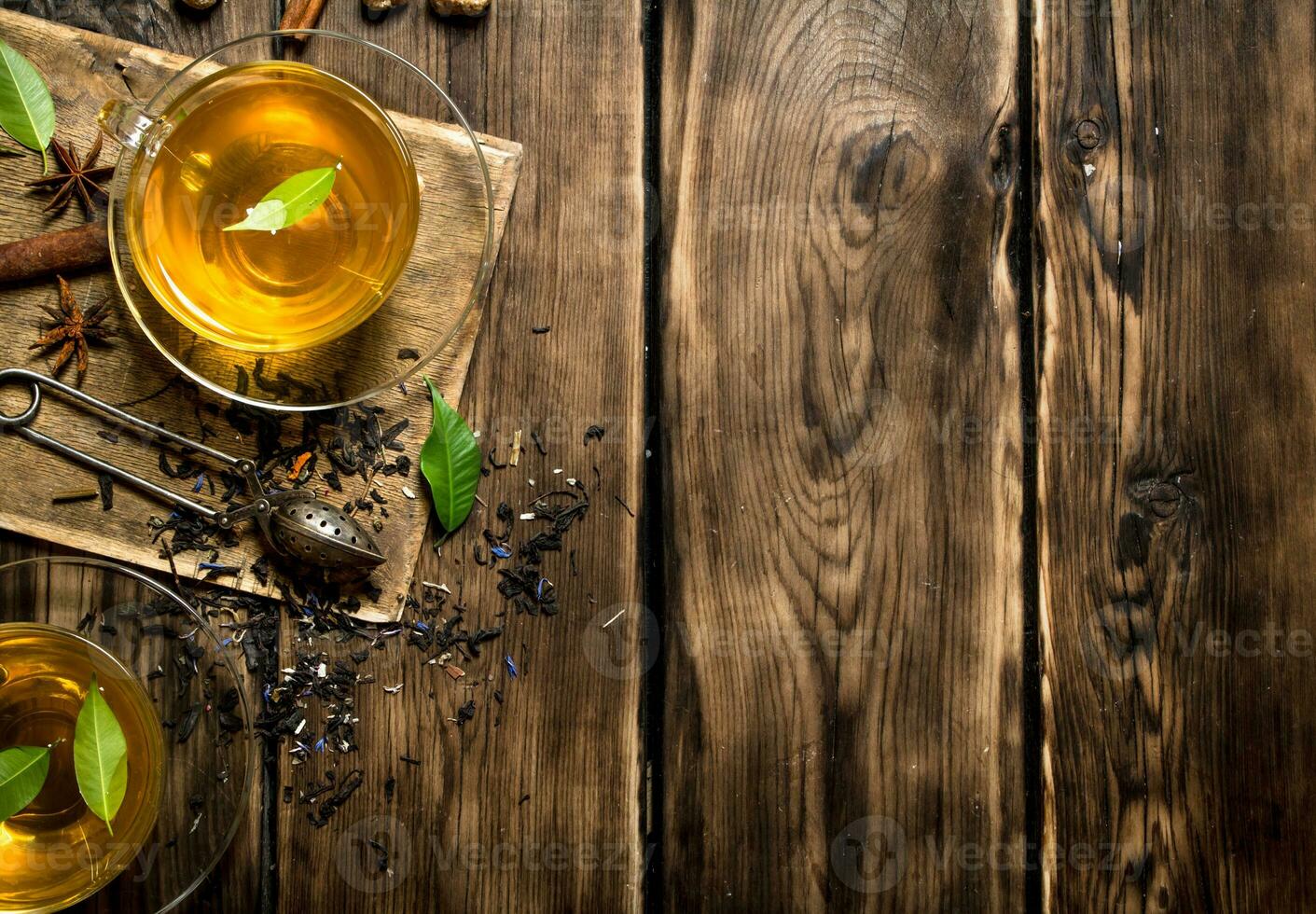 fragrant tea with infuser spoon. photo