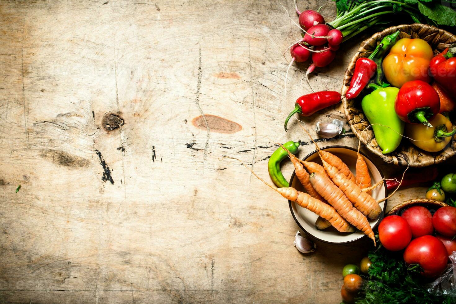 Fresh vegetables on wooden table. photo