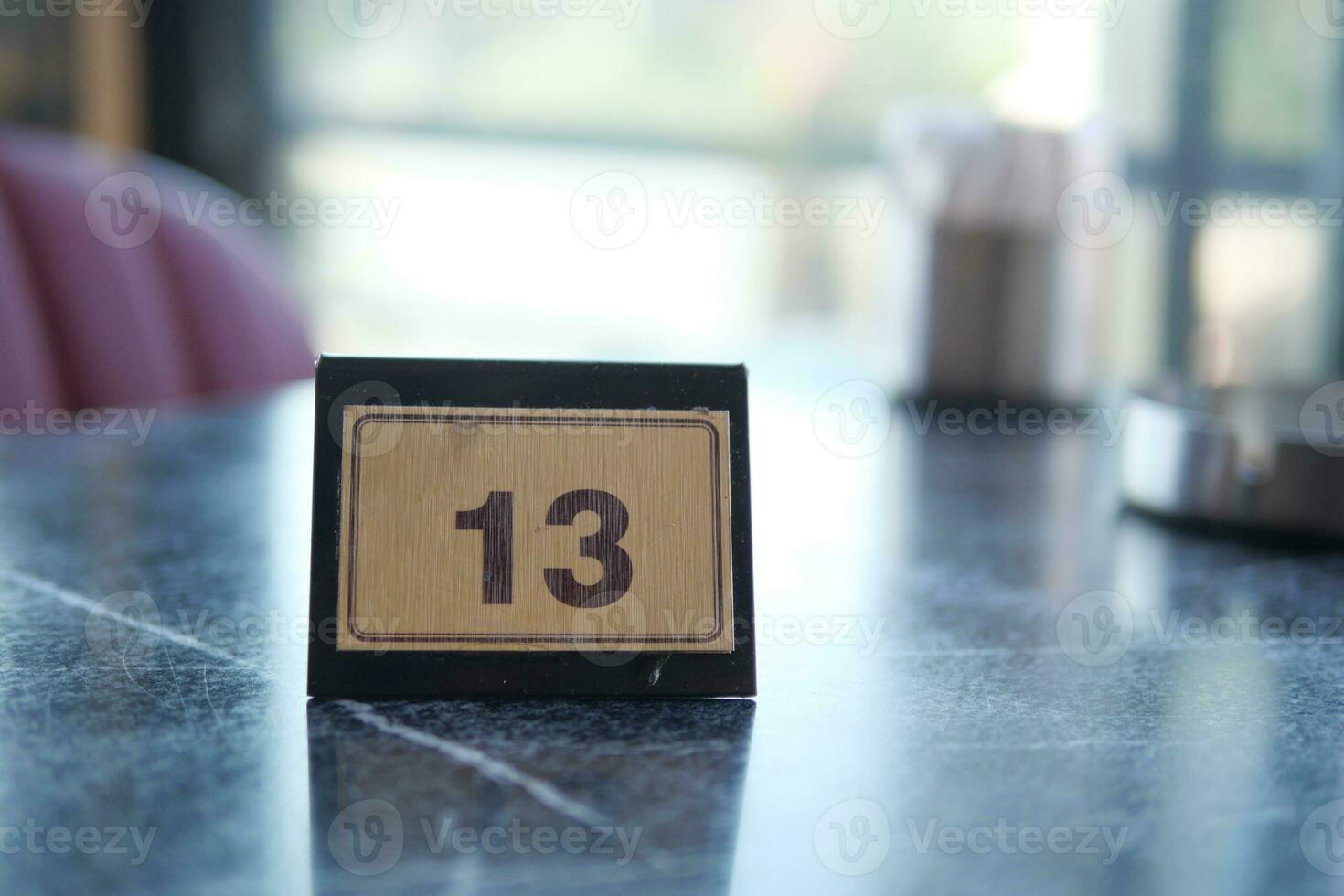 14 number sign number on cafe table . photo