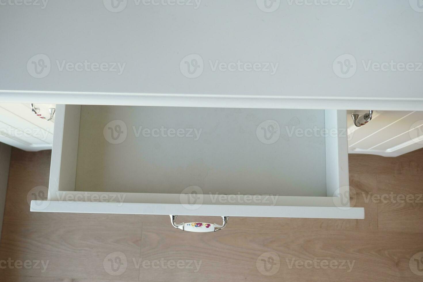 top view of a opened empty drawer photo