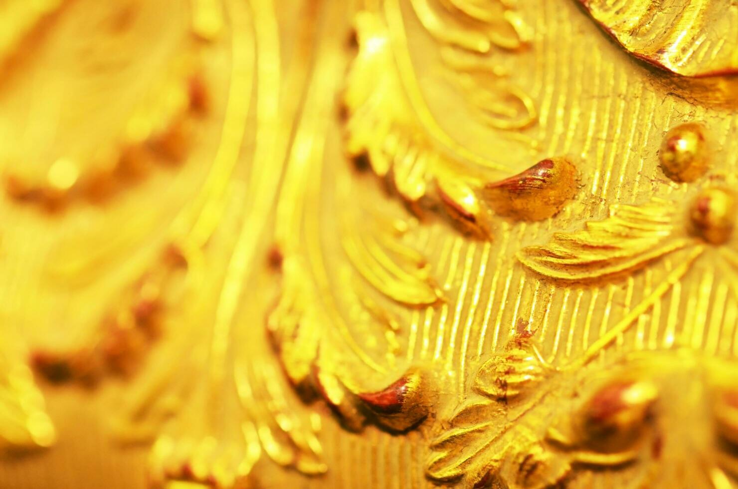 Close up of old baguette of the painting, gold carved leaves. - Image photo